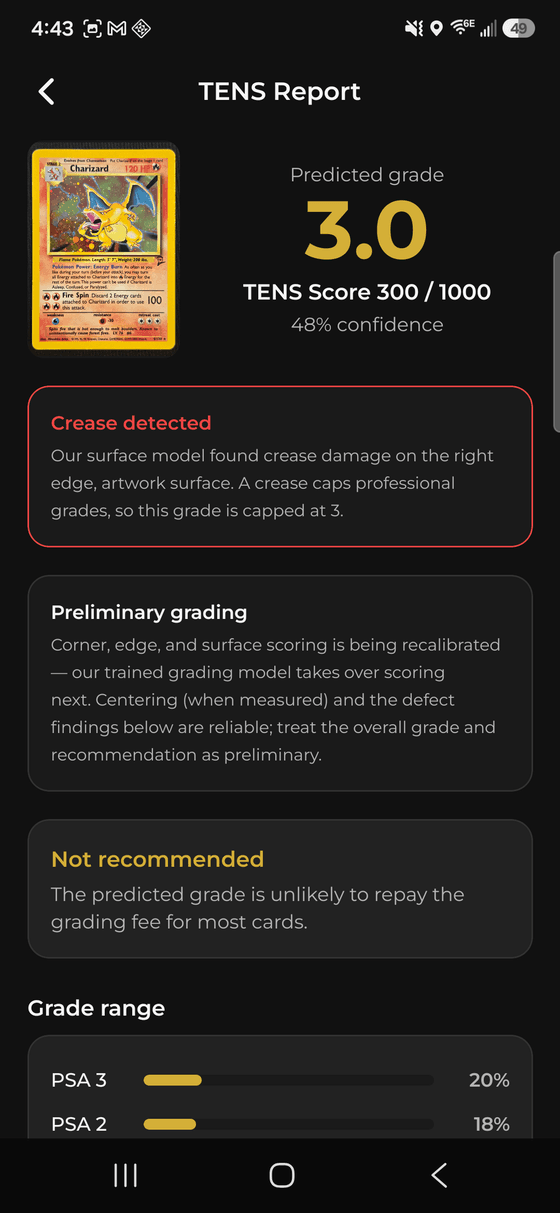 A TENS Report showing a predicted grade, a detected crease and a grade probability range.